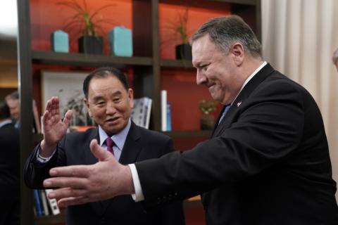 U.S. Secretary of State Mike Pompeo escorts Vice Chairman of the North Korean Workers' Party Committee Kim Yong Chol, North Korea's lead negotiator in nuclear diplomacy with the United States, into talks aimed at clearing the way for a second U.S.-North Korea summit as they meet at a hotel in Washington, U.S., January 18, 2019. PHOTO BY REUTERS/Joshua Roberts