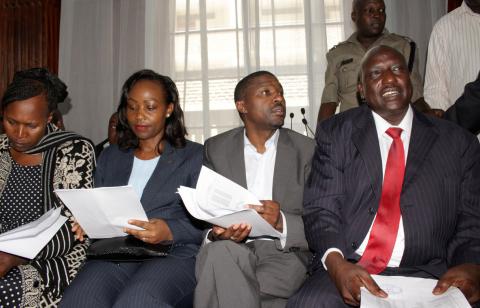 Geoffrey Mwangi (2-R), the chief executive officer of the National Health Insurance Fund, his predecessor Simeon Kirgotty (R), company secretary Ruth Makallah (2-L) and Pamela Marendi (L) sit in the dock at the Mililani Law courts where they were charged for abuse of office and economic crimes in Nairobi, Kenya December 10, 2018. PHOTO BY REUTERS/Stringer