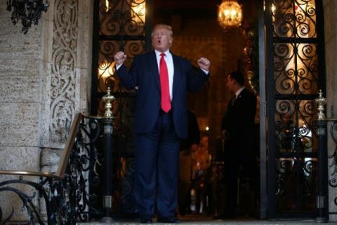 U.S. President-elect Donald Trump talks to members of the media after a meeting meeting with Pentagon officials at Mar-a-Lago estate in Palm Beach, Florida, U.S., December 21, 2016. PHOTO BY REUTERS/Carlos Barria