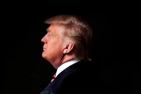 Republican U.S. presidential candidate Donald Trump poses for a photo after an interview with Reuters in his office in Trump Tower, in the Manhattan borough of New York City, U.S., May 17, 2016. PHOTO BY REUTERS/Lucas Jackson