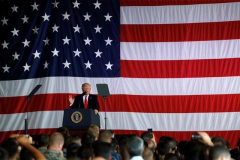 U.S. President Donald Trump delivers remarks to U.S. troops at the Naval Air Station Sigonella to visit U.S. troops before returning to Washington D.C. at Sigonella Air Force Base in Sigonella, Sicily, Italy, May 27, 2017. PHOTO BY REUTERS/Jonathan Ernst
