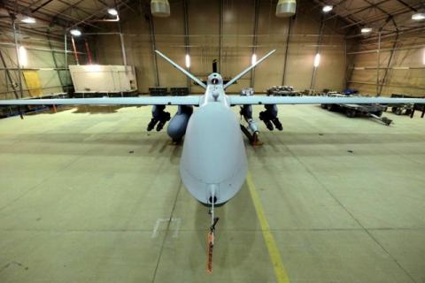 A U.S. Air Force MQ-9 Reaper drone sits armed with Hellfire missiles and a 500-pound bomb in a hanger at Kandahar Airfield, Afghanistan, March 9, 2016. PHOTO BY REUTERS/Josh Smith