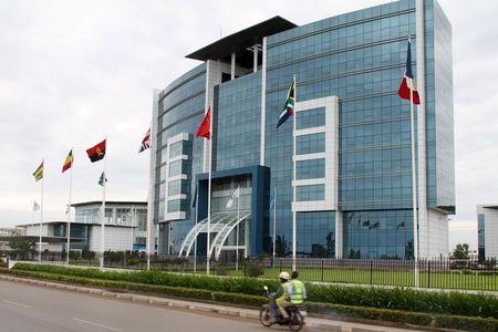 A motorcyclist rides past the Ecobank headquarters in Lome, Togo, June 6, 2015. PHOTO BY REUTERS/Noel Kokou Tadegnon