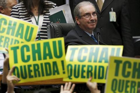 President of the Chamber of Deputies Eduardo Cunha observes congressmen, who support the impeachment, demonstrate during a session to review the request for Brazilian President Dilma Rousseff's impeachment, at the Chamber of Deputies in Brasilia, Brazil, April 16, 2016. PHOTO BY REUTERS/Ueslei Marcelino