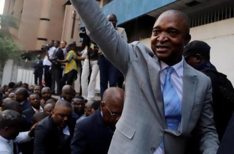 Former Congolese interior minister Emmanuel Ramazani Shadary waves to his supporters at the Congo's electoral commission (CENI) head offices at the Gombe Municipality in Kinshasa, Democratic Republic of Congo, August 8, 2018. PHOTO BY REUTERS/Kenny Katombe