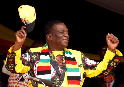 President Emmerson Mnangagwa greets supporters of his ZANU PF party at a rally in Murombedzi, Zimbabwe, November 24, 2018. PHOTO BY REUTERS/Philimon Bulawayo