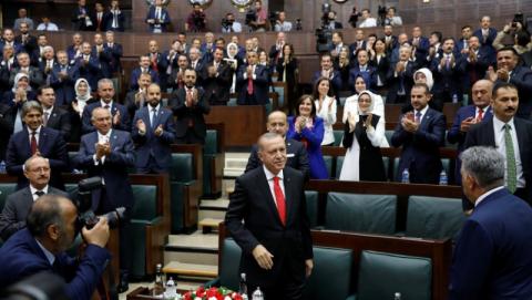 Turkish President Tayyip Erdogan greets members of parliament from his ruling AK Party (AKP) as he arrives at the Turkish parliament in Ankara, Turkey, July 7, 2018. PHOTO BY REUTERS/Umit Bektas