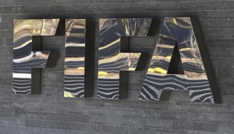 The FIFA logo is seen at the FIFA headquarters in Zurich, Switzerland, March 18, 2016. PHOTO BY REUTERS/Ruben Sprich