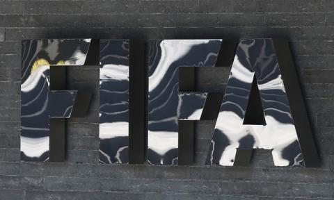 The FIFA logo is seen at the FIFA headquarters in Zurich, Switzerland, March 18, 2016. PHOTO BY REUTERS/Ruben Sprich