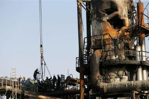 Workers are seen at the damaged site of Saudi Aramco oil facility in Abqaiq, Saudi Arabia, September 20, 2019. PHOTO BY REUTERS/Hamad l Mohammed