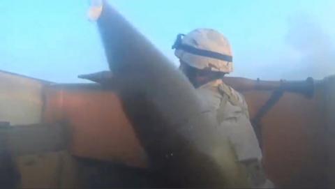An Islamic State fighter is seen carrying a rocket-propelled grenade launcher in Iraq, in this still image taken from an amateur video supplied by Kurdish Peshmerga and received by Reuters, April 29, 2016. PHOTO BY REUTERS TV