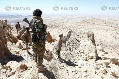 Yemeni soldiers stand on their position on a mountain on the frontline of fighting with Houthis in Nihem area, near Sanaa, Yemen, January 27, 2018. PHOTO BY REUTERS/Faisal Al Nasser
