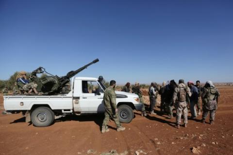 Rebel fighters gather during their advance towards the Islamic State-held city of al-Bab, northern Syria, October 26, 2016. PHOTO BY  REUTERS/Khalil Ashawi