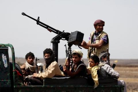 Houthi fighters ride on the back of a patrol truck as they secure the site of a pro-Houthi tribal gathering in a rural area near Sanaa, Yemen, July 21, 2016. PHOTO BY REUTERS/Khaled Abdullah