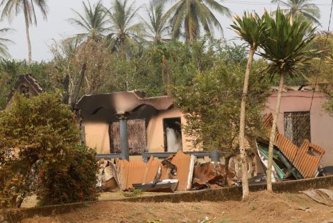 A goat walks past burned and damaged buildings in Kembong, south-west region of Cameroon, December 29, 2017. PHOTO BY REUTERS/Josiane Chemou