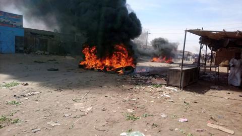 A bonfire is lit along the street during protests against price increases in Atbara, Nile River state in northeastern Sudan, December 20, 2018. PHOTO BY REUTERS/El tayeb Siddig