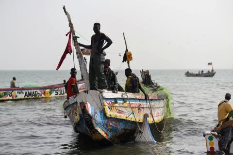 Fishermen land their boat at the beach near the coastal town of Joal-Fadiouth, Senegal, April 10, 2018. PHOTO BY REUTERS/Sylvain Cherkaoui 