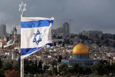 An Israeli flag is seen near the Dome of the Rock, located in Jerusalem's Old City on the compound known to Muslims as Noble Sanctuary and to Jews as Temple Mount, December 6, 2017. PHOTO BY REUTERS/Ammar Awad