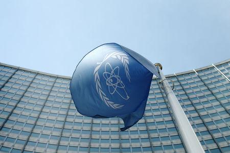 The flag of the International Atomic Energy Agency (IAEA) flies in front of its headquarters in Vienna, Austria, May 28, 2015. PHOTO BY REUTERS/Heinz-Peter Bader