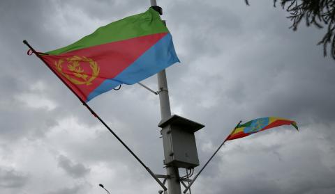 Ethiopian and Eritrean flags flutter during the welcoming ceremony of Eritrean Foreign Minister Osman Saleh and his delegation at the Bole International Airport in Addis Ababa, Ethiopia, June 26, 2018. PHOTO BY REUTERS/Tiksa Negeri