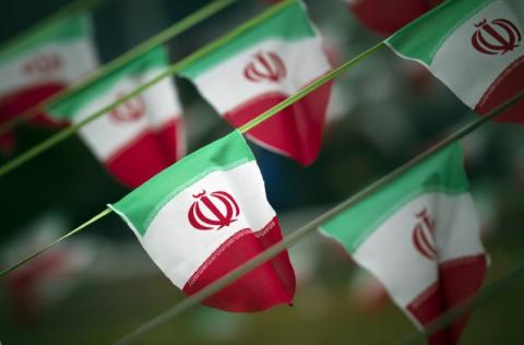 Iran's national flags are seen on a square in Tehran, February 10, 2012. PHOTO BY REUTERS/Morteza Nikoubazl