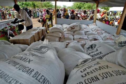 Stocks of food aid are piled at a distribution centre, where more than 1,000 women and children wait to receive emergency supplies at the village of Yama in northwestern Niger in a file photo. PHOTO BY REUTERS/Finbarr O'Reilly