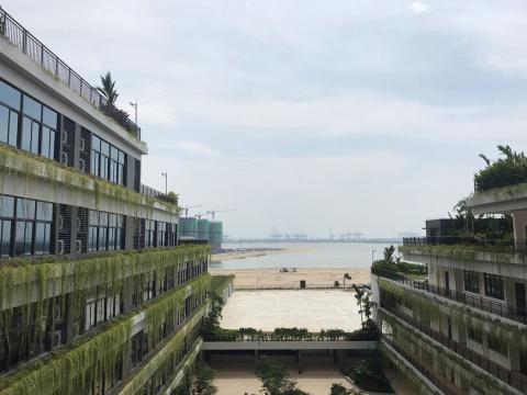 The Shattuck-St Mary's School Forest City campus overlooks ongoing construction and the Port of Tanjung Pelepas in Johor, Malaysia, August 20, 2018. PHOTO BY REUTERS/Fathin Ungku