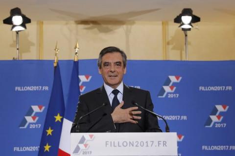 Francois Fillon, former French prime minister and member of Les Republicains political party, delivers his speech after partial results in the second round for the French center-right presidential primary election in Paris, France, November 27, 2016. REUTERS/Christian Hartmann