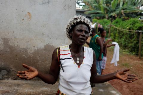 Grace Nah, 70, who fled violence in the northwestern division of Momo reacts as she speaks outside the house where she has taken refuge in Yaounde, Cameroon, October 2, 2018. PHOTO BY REUTERS/Zohra Bensemr