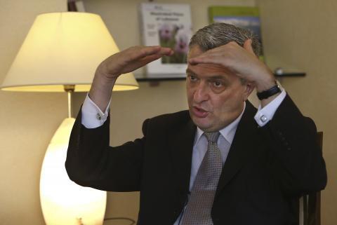 Filippo Grandi, head of the U.N. Relief and Works Agency (UNRWA), gestures during an interview in Beirut