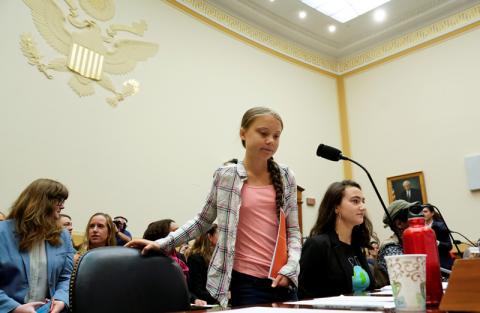 Sixteen year-old Swedish climate activist Greta Thunberg takes her seat to testify at a House Foreign Affairs subcommittee and House Select Climate Crisis Committee joint hearing on "Voices Leading the Next Generation on the Global Climate Crisis" on Capitol Hill in Washington U.S., September 18, 2019. PHOTO BY REUTERS/Kevin Lamarque