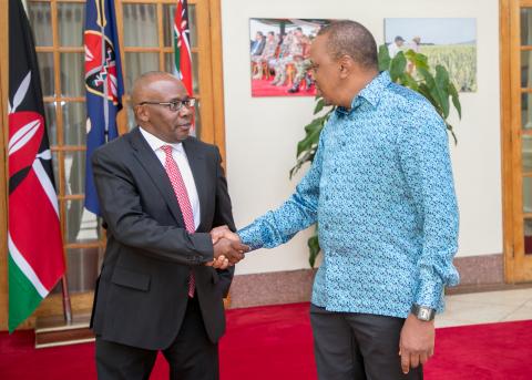 Kenya's President Uhuru Kenyatta (R) meets Attorney General Githu Muigai after Muigai handed in his resignation letter at State House in Nairobi, Kenya, February 13, 2018. PHOTO BY REUTERS/Presidential Press Service