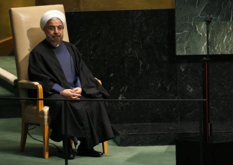 Iranian President Hassan Rouhani sits in a chair reserved for heads of state before his address to the 69th United Nations General Assembly at United Nations Headquarters in New York, September 25, 2014. PHOTO BY REUTERS/Mike Segar