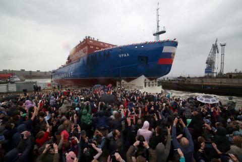 People attend the float out ceremony of the nuclear-powered icebreaker "Ural" at the Baltic Shipyard in St. Petersburg, Russia, May 25, 2019. PHOTO BY REUTERS/Anton Vaganov