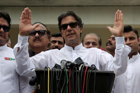 Cricket star-turned-politician Imran Khan, chairman of Pakistan Tehreek-e-Insaf (PTI), speaks to members of media after casting his vote at a polling station during the general election in Islamabad, Pakistan, July 25, 2018. PHOTO BY REUTERS/Athit Perawongmetha