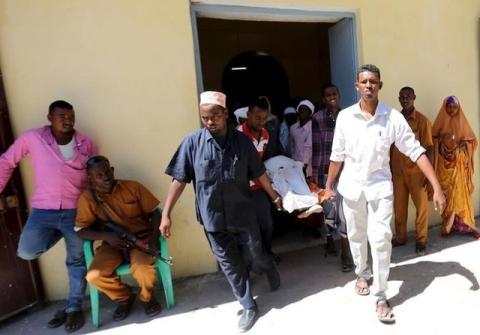 A Somali man injured in a mortar attack is carried on a stretcher by relatives at Darul Shifa Hospital in the capital Mogadishu, February 25, 2016. PHOTO BY REUTERS/Feisal Omar