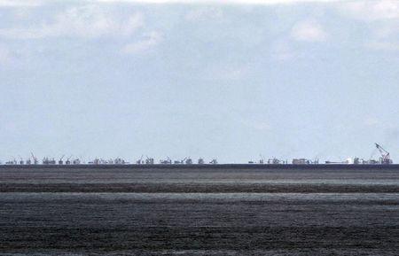 The alleged on-going land reclamation of China at Subi reef is seen from Pagasa island (Thitu Island) in the Spratlys group of islands in the South China Sea, west of Palawan, Philippines, May 11, 2015. PHOTO BY REUTERS/Ritchie B. Tongo