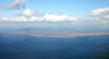 An aerial view shows Kunashiri Island, one of four islands known as the Southern Kuriles in Russia and Northern Territories in Japan, is seen in this photo taken 2005. PHOTO BY REUTERS/Kyodo