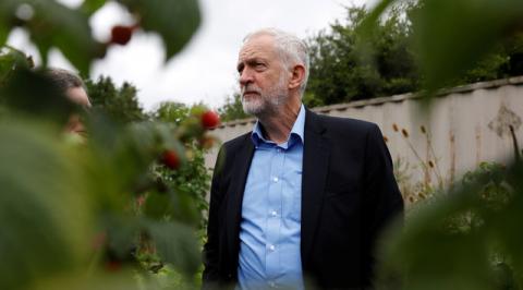 Britain's opposition Labour Party leader Jeremy Corbyn stands in the garden at the Olive Tree Cafe in Swindon, Britain, August 11, 2017. PHOTO BY REUTERS/Peter Nicholls