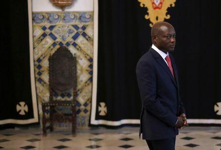 Guinea-Bissau's President Jose Mario Vaz arrives to speak with journalists after a meeting with his Portuguese counterpart Anibal Cavaco Silva (not pictured) at Belem presidential palace in Lisbon, June 19, 2014. REUTERS/Rafael Marchante