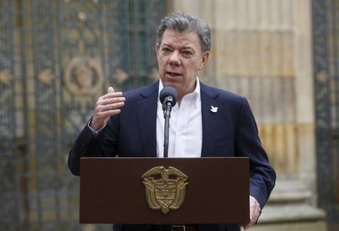 Colombia's President Juan Manuel Santos speaks after casting his vote during local and regional elections at Bolivar Square in Bogota, Colombia October 25, 2015. PHOTO BY REUTERS/John Vizcaino