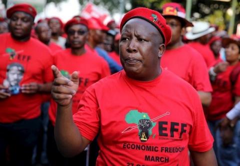 Leader of South Africa's left-wing Economic Freedom Fighters (EFF) Julius Malema gestures after arriving at the Johannesburg Stock Exchange (JSE) in Sandton, October 27, 2015. PHOTO BY REUTERS/Siphiwe Sibeko