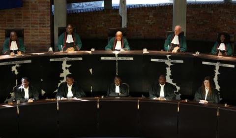 South Africa's Chief Justice Mogoeng Mogoeng (Top, C) looks on with other judges before making a ruling at the Constitutional Court in Johannesburg, South Africa, June 22,2017. PHOTO BY REUTERS/Siphiwe Sibeko