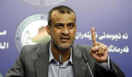 Kadhim al-Sayadi, a lawmaker, speaks during a news conference in Baghdad, August, 11, 2015. PHOTO BY REUTERS/Ahmed Saad