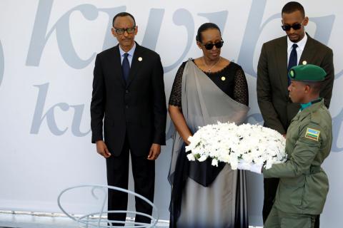 Rwandan President Paul Kagame, Jeannette Kagame and their oldest son Ivan Cyomoro Kagame attend a wreath laying ceremony during the commemoration of the 25th anniversary of the genocide at the Genocide Memorial in Gisozi in Kigali, Rwanda, April 7, 2019. PHOTO BY REUTERS/Baz Ratner