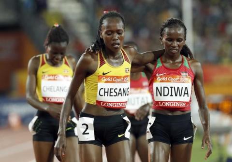 Stella Chesang of Uganda and Stacy Ndiwa of Kenya. PHOTO BY REUTERS/Jeremy Lee