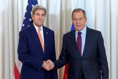 U.S. Secretary of State John Kerry (L) and Russian Foreign Minister Sergei Lavrov (R) shake hands during a bilateral meeting focused on the Syrian crisis in Geneva, Switzerland, August 26, 2016. PHOTO BY REUTERS/Martial Trezzini