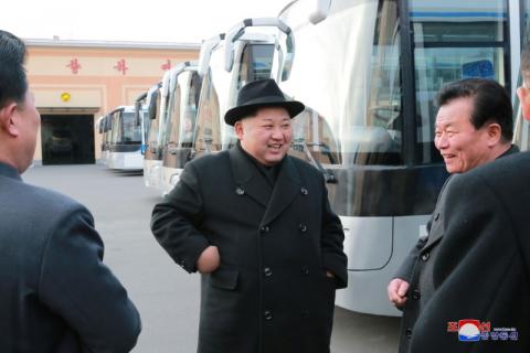 North Korean leader Kim Jong Un inspects a newly established Pyongyang trackless trolley factory in this undated photo released by North Korea's Korean Central News Agency (KCNA) in Pyongyang on February 1, 2018. PHOTO BY RUTERS/KCNA