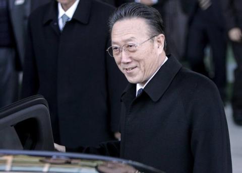North Korean spy chief Kim Yang Gon gets in a car upon his arrival at the transit office near the truce village of Panmunjom in the demilitarized zone that separates the two Koreas in Paju, north of Seoul, in this file picture taken November 29, 2007. PHOTO BY REUTERS/Han Jae-Ho