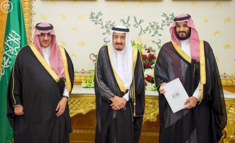 (L-R) Saudi Crown Prince Mohammed bin Nayef, Saudi King Salman, and Saudi Arabia's Deputy Crown Prince Mohammed bin Salman stand together after Saudi Arabia's cabinet agrees to implement a broad reform plan known as Vision 2030 in Riyadh, April 25, 2016. PHOTO BY REUTERS/Saudi Press Agency